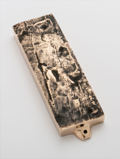 MEZUZAH OF BRONZE <br /> OSTROŁĘKA <br /> UL. GOMULICKIEGO 20