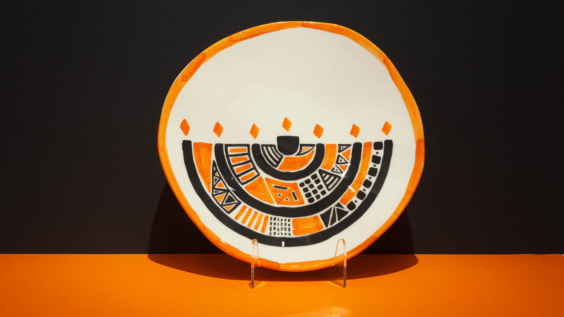 Menorah: Jewish symbol hand-painted in black and orange. Jewish gift plate.
