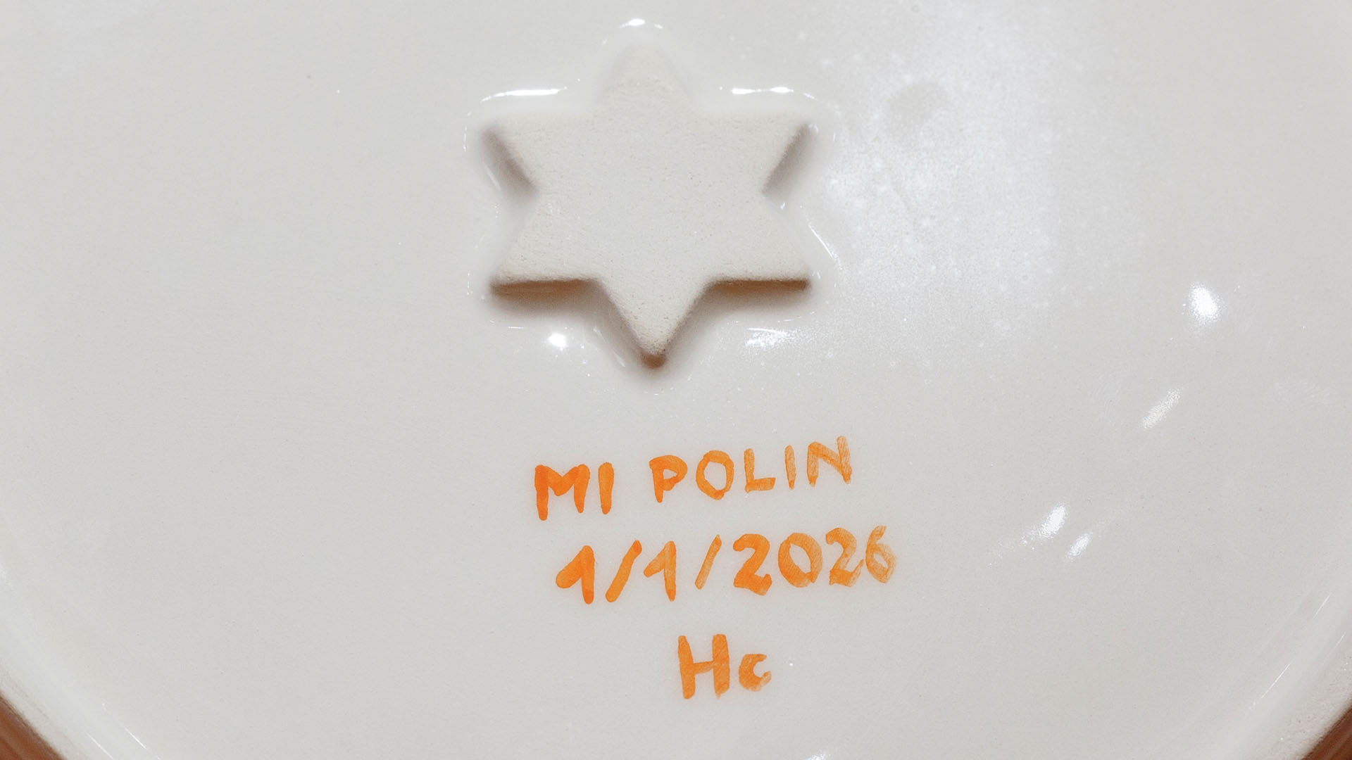 Star of David. The ceramic plate was treated as a painting. The Star of David was hand-painted by Helena Czernek co-designer MI POLIN, who, together with Aleksander Prugar, developed the unique painting patterns. The plates painting are inspired by the Cubist style and Polish graphic design of the 1960s and 1970s. Made at MI POLIN and entirely manufactured in Poland.