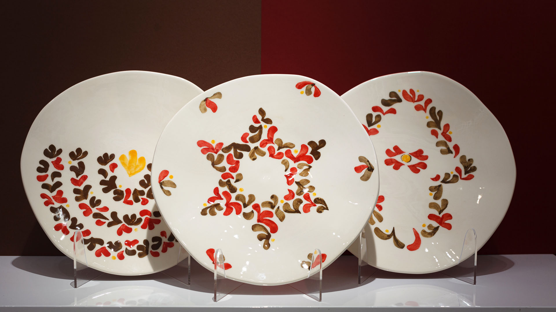 Seder plates hand-painted with typical Jewish motifs like the Star of David, Hamsa, and Menorah. The perfect Jewish gift.