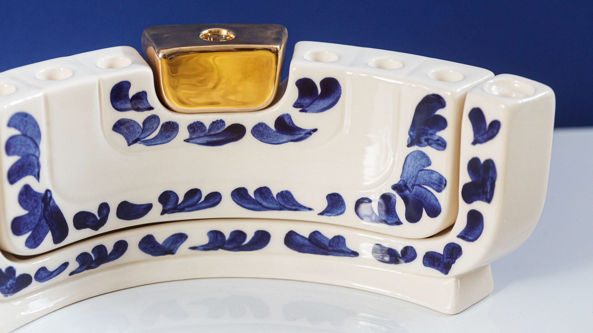 MENOKIAH is the only Jewish candle holder that allows you to combine as many as three candelabra! MENOKIAH combines a twofold shabbat candelabrum and a sevenfold menorah. When you put them together, they will form a ninefold chanukiach. Because of this MENOKIAH can be used all year long! The name MENOKIAH is a combination of the words MENOrah and ChanuKIAH. Each MENOKIAH consists of three separate pieces: a shamesh, a menorah, and a two-branched Shabbat candlestick. Developed and designed by MI POLIN