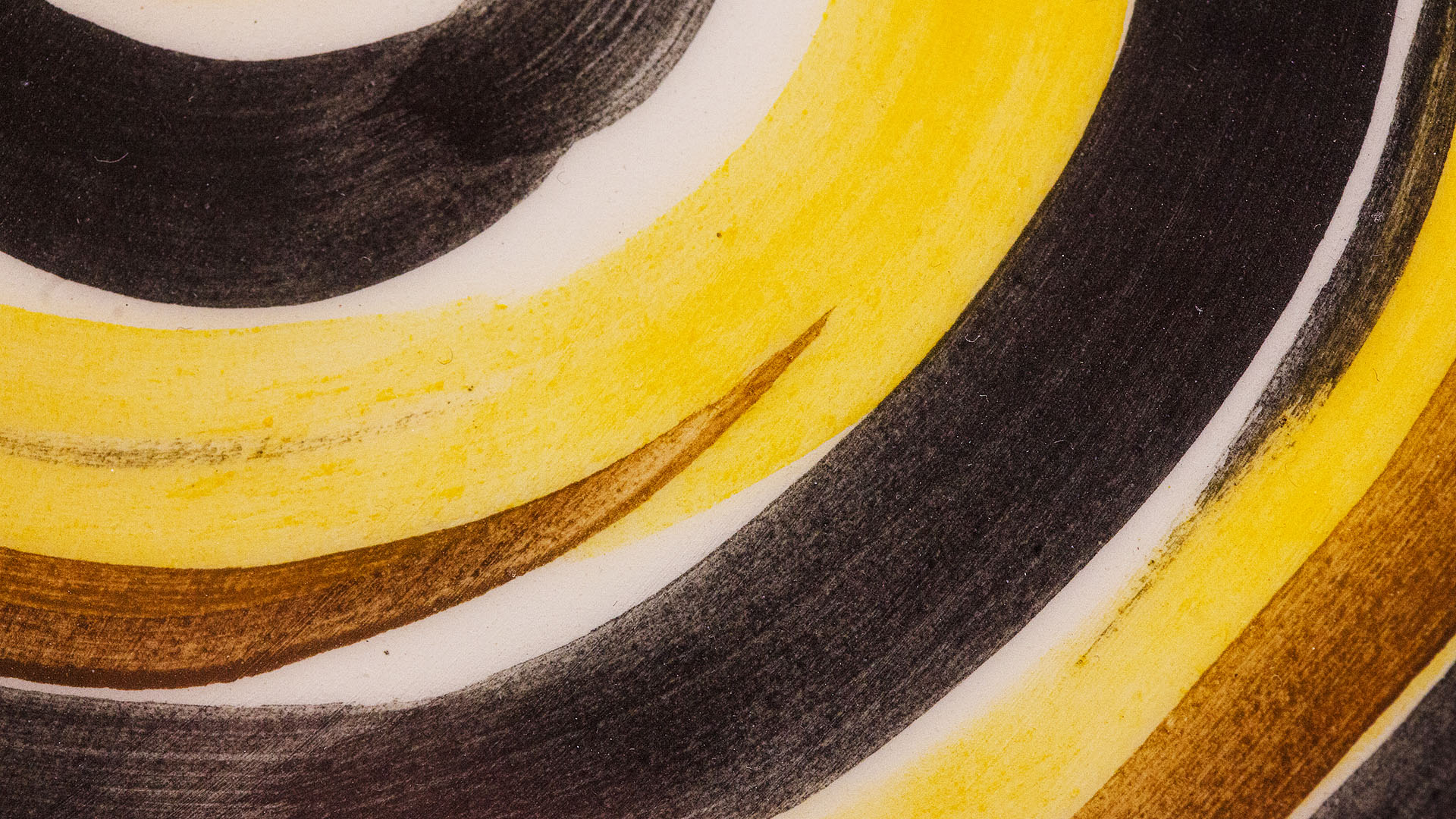 Menorah plate. The ceramic plate was treated as a painting. Menorah plate was hand-painted by Helena Czernek co-designer MI POLIN, who, together with Aleksander Prugar, developed the unique painting patterns. The plates painting are inspired by Polish graphic design of the 1960s and 1970s. This refers to the pottery factories of Włocławek and Tułowice. Made at MI POLIN and entirely manufactured in Poland.