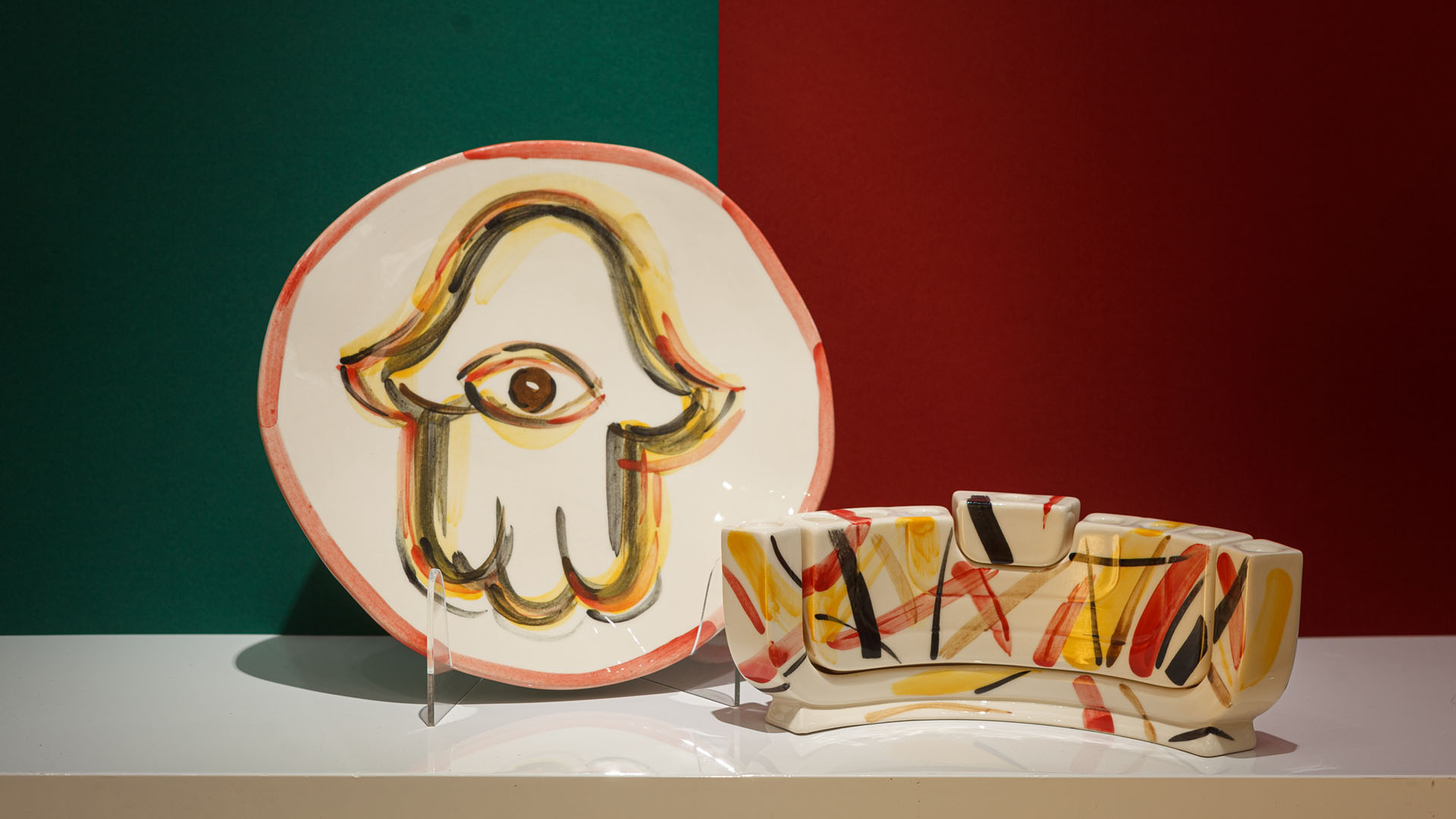 Hand-painted Judaica. Menorah and Seder plate decorated with a Hamsa. Hand-painted by Helena Czernek of MI POLIN